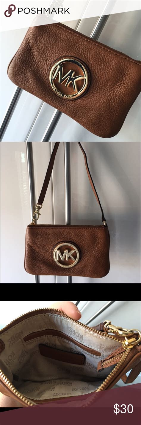 michael kors cognac letter tasche clutch|Michael Kors wristlets.